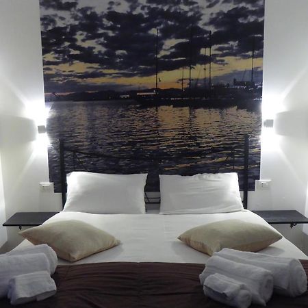 I Giganti Apartment กาญารี ภายนอก รูปภาพ
