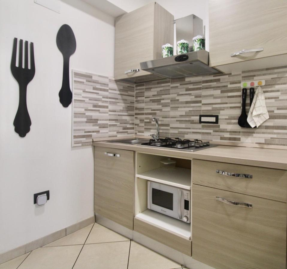I Giganti Apartment กาญารี ภายนอก รูปภาพ